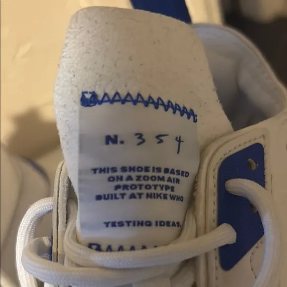 White and Blue Nike Golf shoes